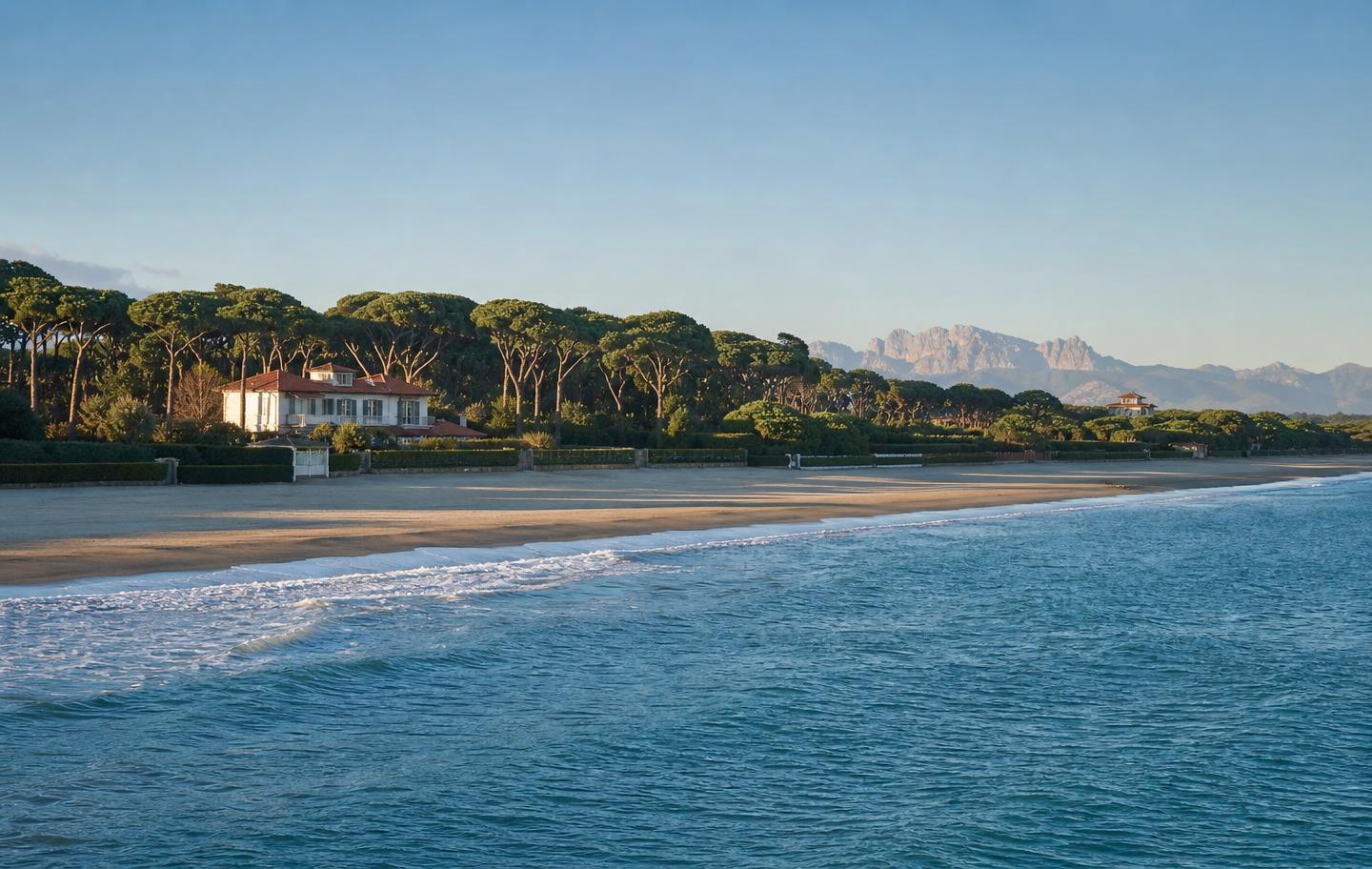 Panoramic view of a prestigious Forte dei Marmi beachfront villa and the Tyrrhenian sea