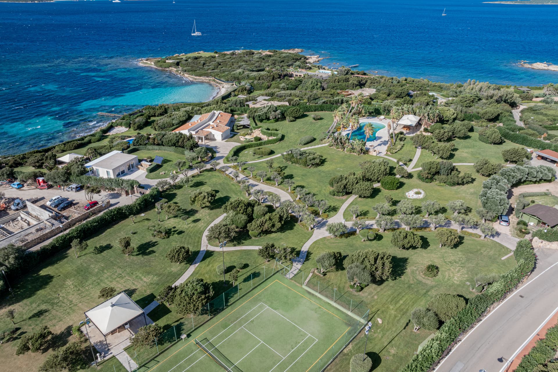 Aerial view of an imposing Costa Smeralda estate with private shoreline and pools